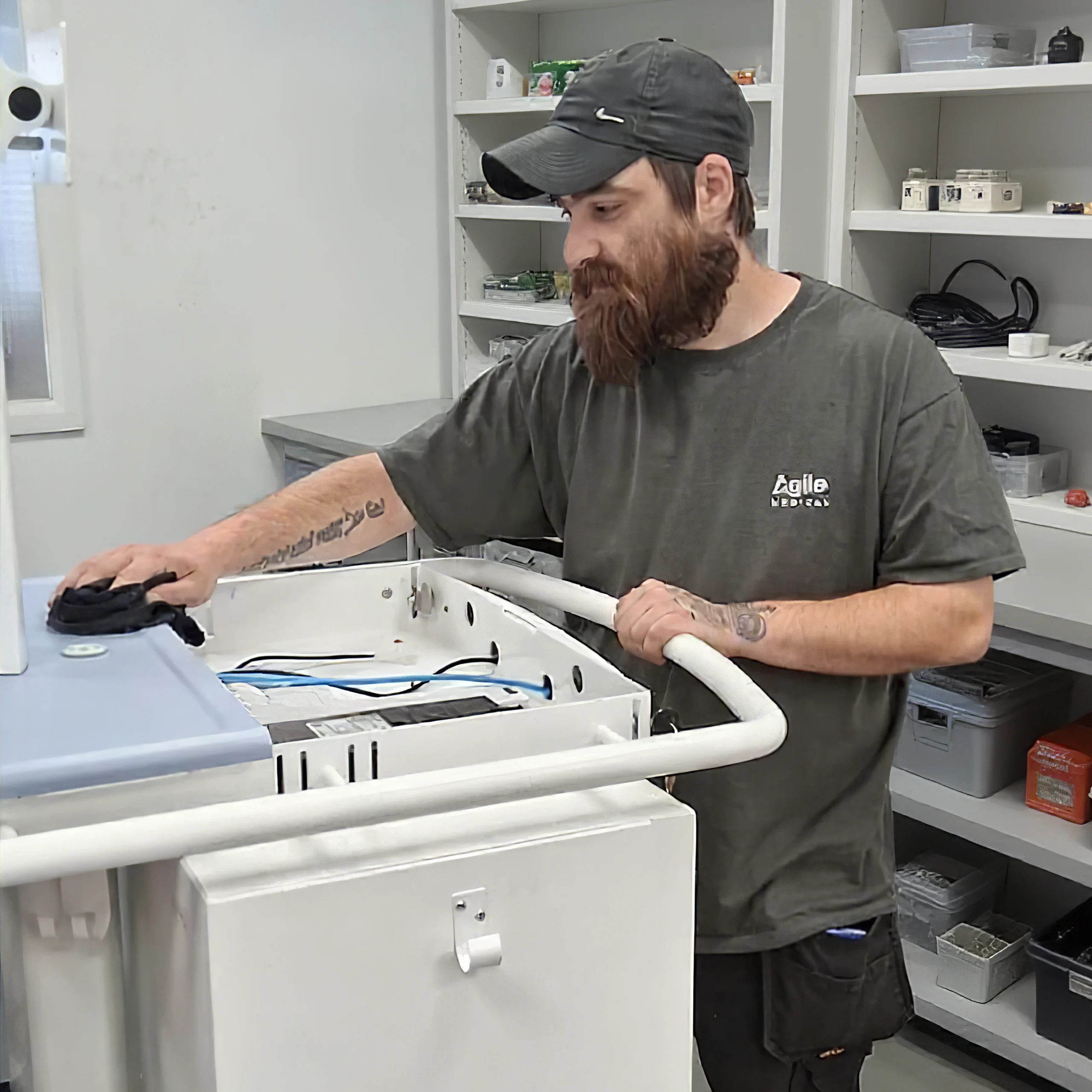 Exura engineer polishing an Exura EPR / ePMA cart