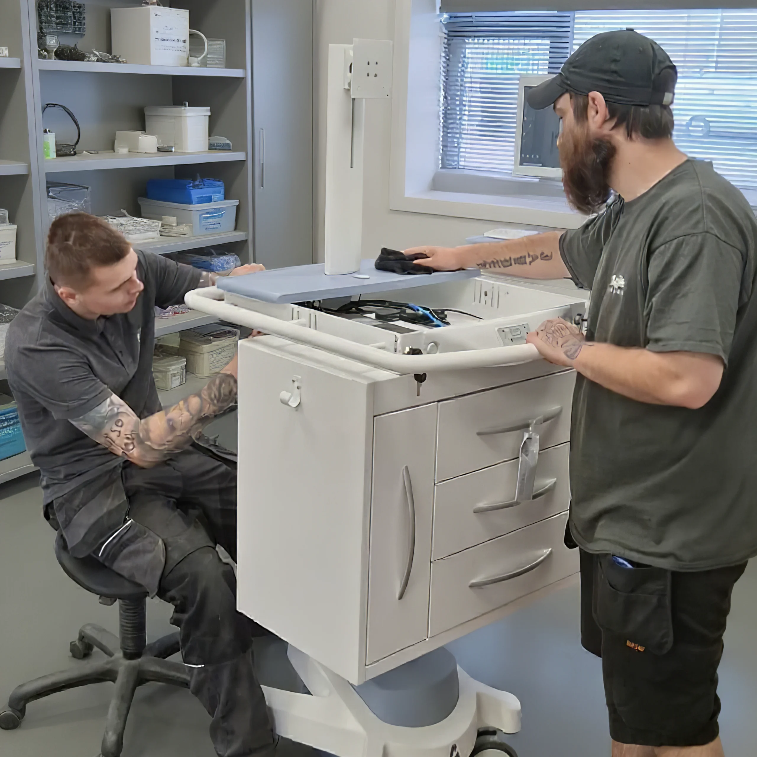 Exura engineers manufacturing an Exura EPR / ePMA cart